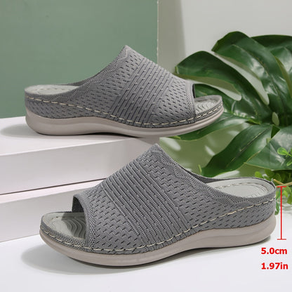 Women's orthopedic wedge slides featuring arch support, comfortable for walking and working.